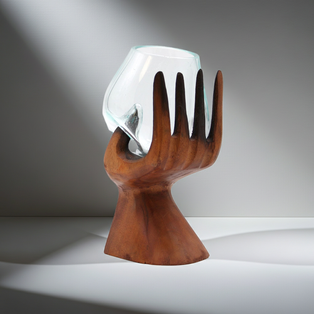 Carved Hand with Molten Glass Bowl